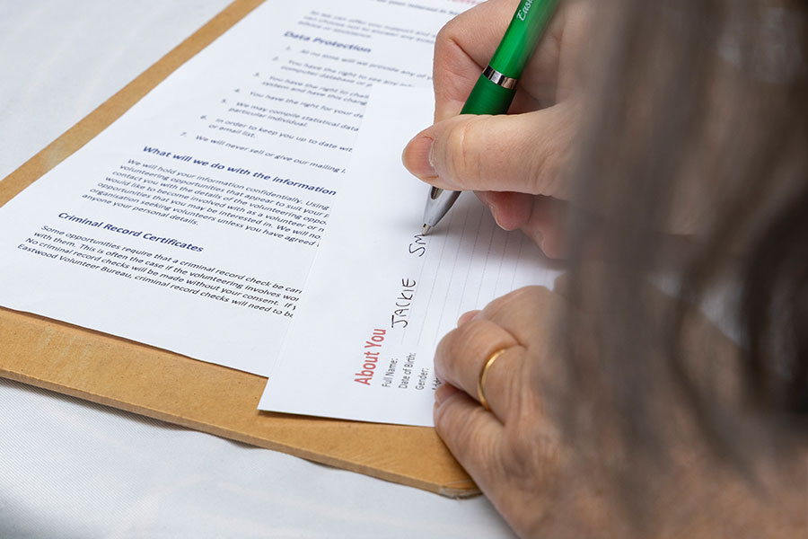 A Food Bank assessment form being filled in by one of our Volunteers on behalf of a local resident