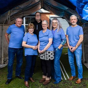 Some of our volunteers stood under our Food Bank gazebo outside the bureau